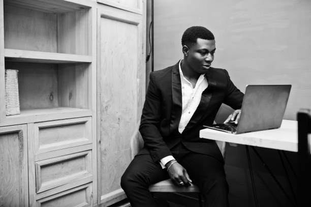 istock Strong powerful african american man in black suit 1143078151
