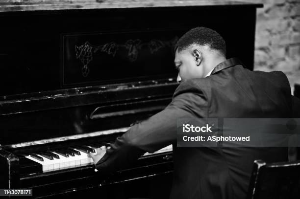 Strong Powerful African American Man In Black Suit Stock Photo - Download Image Now - Jazz Music, Retro Style, Piano