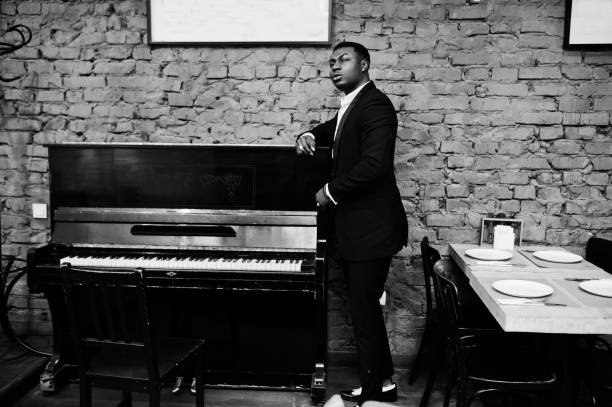 istock Strong powerful african american man in black suit 1143078259