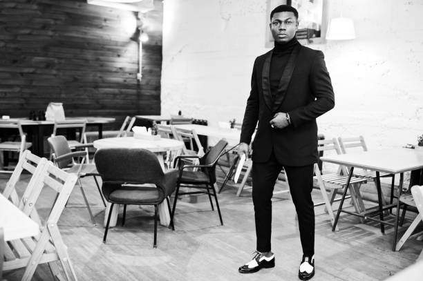 istock Strong powerful african american man in black suit 1143078277