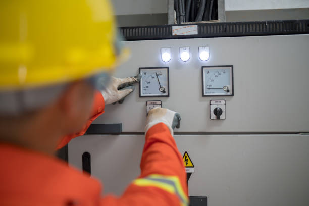 istock Electrical engineers inspect the power meter system in the building. 1143078679