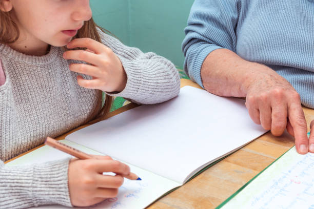 istock Doing Homework with Grandmother can be Fun 1143078804