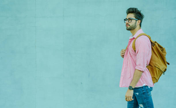 istock Young man walking in the city 1143079943