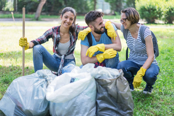 istock Young people doing charity work in their city 1143081153