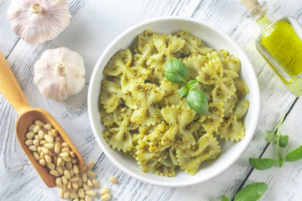 istock Portion of farfalle with pesto with ingredients 1143082105