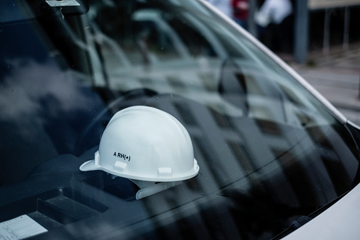 Close-Up Work Helmet in a Car.