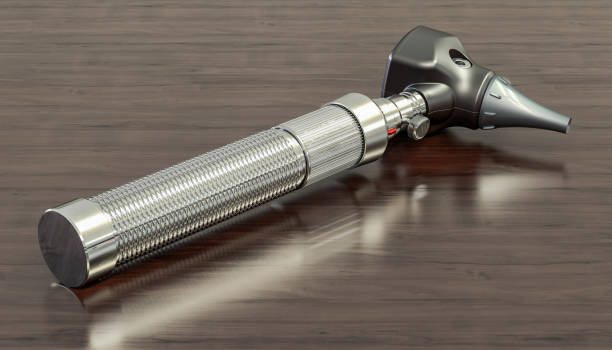 istock Otoscope on the wooden table, 3D rendering 1143088618