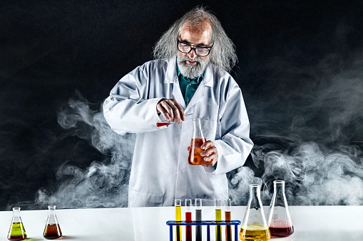 Unhinged chemist in danger of smoke inhalation.