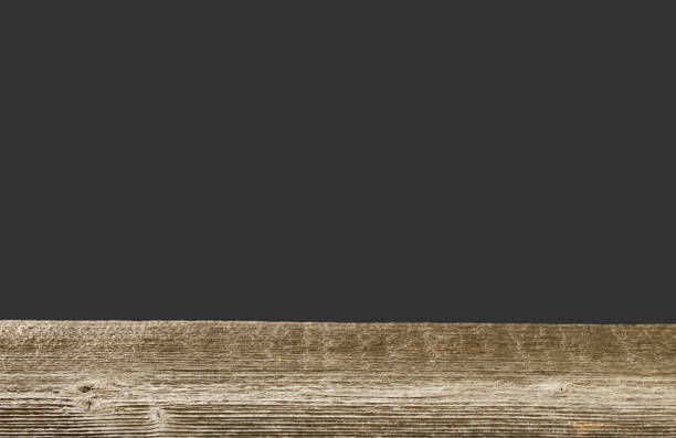 istock Wooden plank on dark background. Rustic wood texture. 1143089715