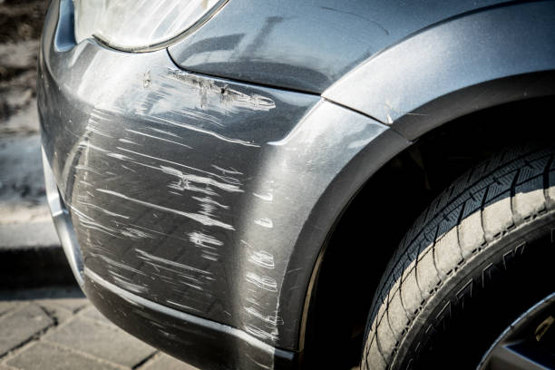 Scratches on the car bumper after a small accident. Scratches on the car bumper after a small accident. Scratches on the car bumper after a small accident. harm stock pictures, royalty-free photos & images