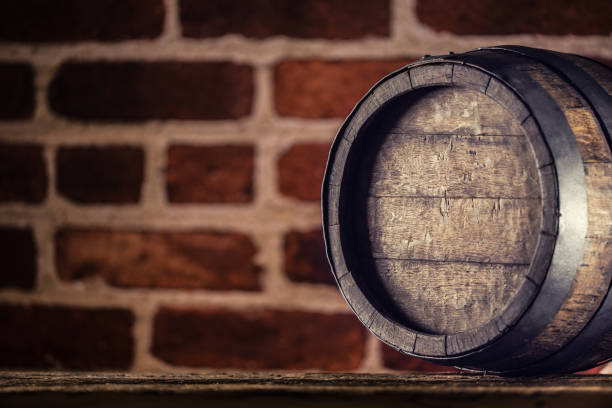 istock Wine beer cognac whiskey or rum barrel on wooden table 1143092910