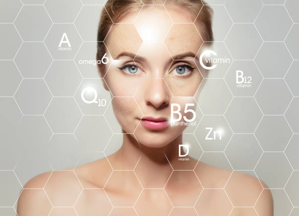 женский портрет лица с графическими иконками витаминов и минералов для лечения кожи - vitamin a стоковые фото и изображения