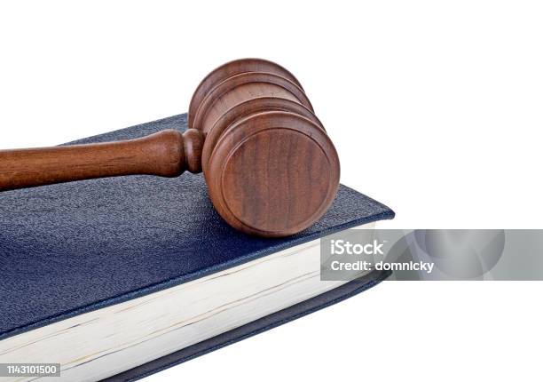 Wooden Gavel And Blue Book Isolated On White Background Stock Photo - Download Image Now