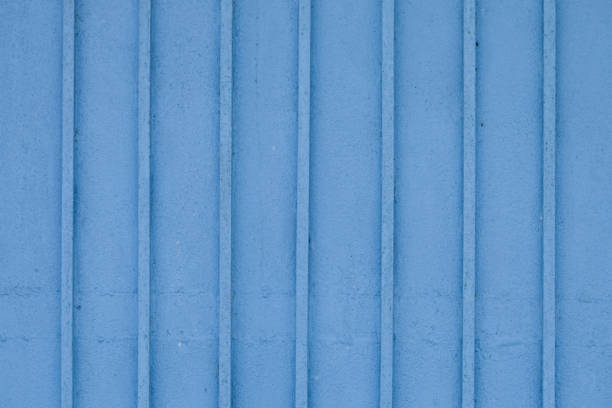 istock Wooden blue painted striped plank wall background. 1143101691