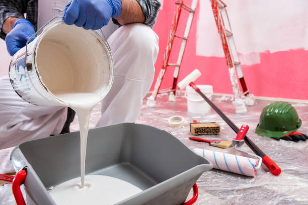 istock House painter worker at work in the construction site. Building. 1143104660