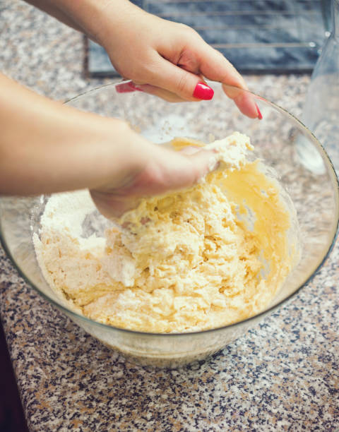 istock Woman Preparing Donuts at Home 1143104932