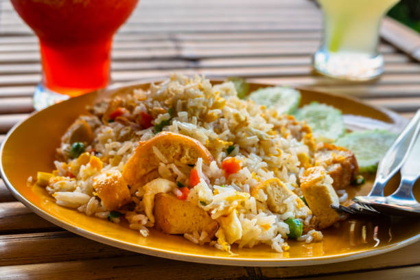 istock Authentic cuisine pad Thai with rice smoked tofu bean sprouts peanuts and lime garnish 1143105063