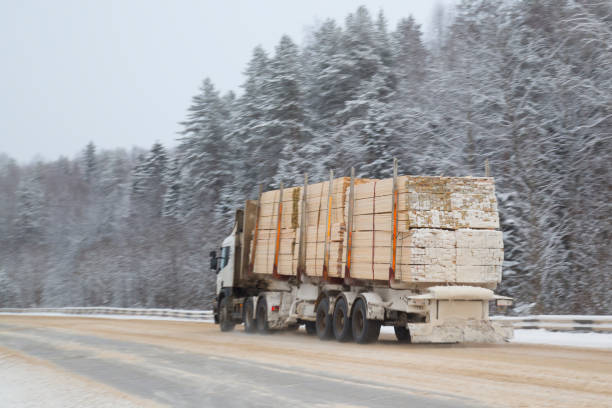istock Logging truck on the highway in winter. 1143109308