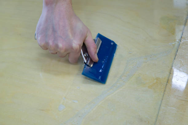 istock installation of protective film on Windows 1143110421