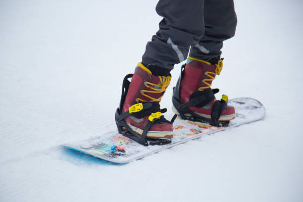istock A snowboarder rides a snowboard. 1143111235