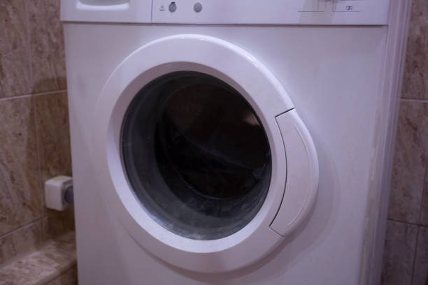 istock Washing machine in the bathroom. 1143113482