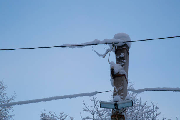 istock Electric wires in the snow. 1143113558