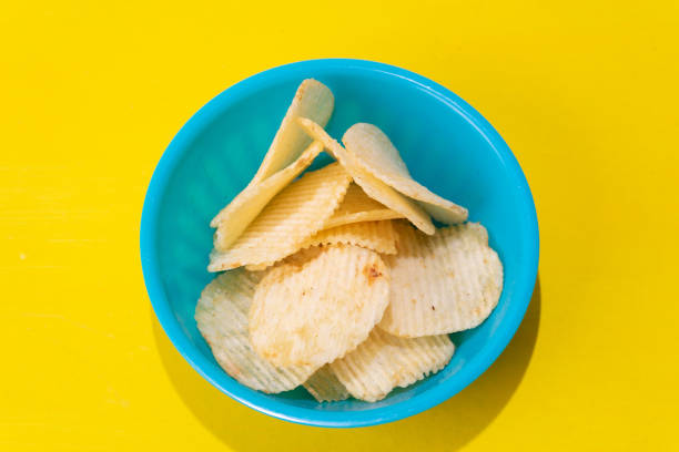 istock Ridged chips on colorful background 1143115450