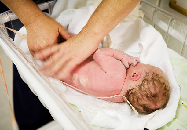 istock Measuring newborn baby 114311721