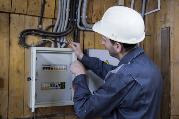 istock Electrician working near a switchboard. 1143119541