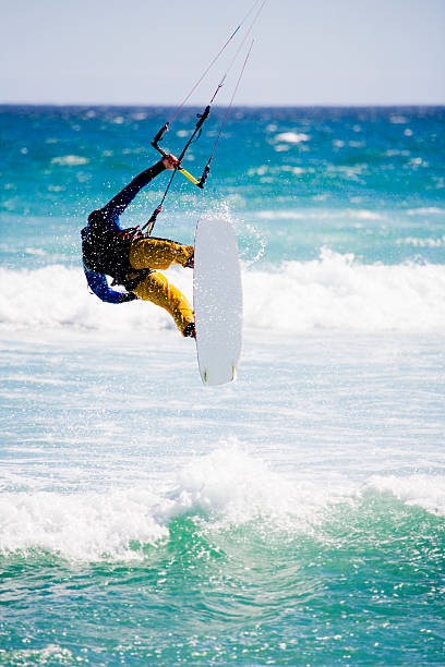 Airborne kite surfer  kiteboarding stock pictures, royalty-free photos & images