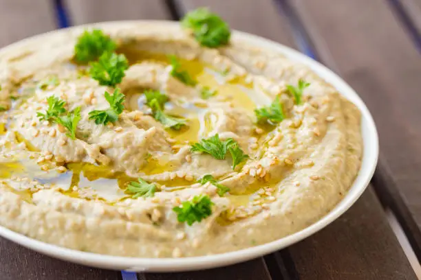 Vegan baba ghanoush, a levantine appetizer of mashed cooked eggplant mixed with tahini, olive oil, and various seasonings