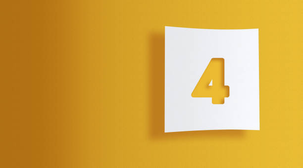Number 4; cut out on white square paper on yellow background with large copy space
