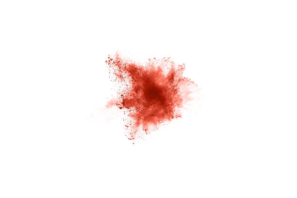 istock living coral color powder explosion on white background. 1143129584
