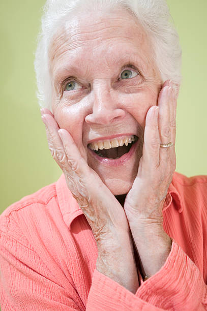 istock happy senior woman 114313236
