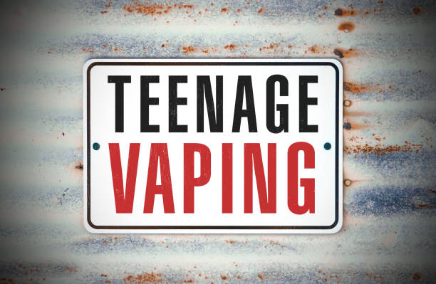 istock teenage vaping 1143133160