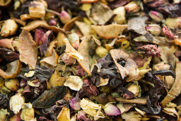 istock Herbal tea with flower blossoms and fruits. 1143133522