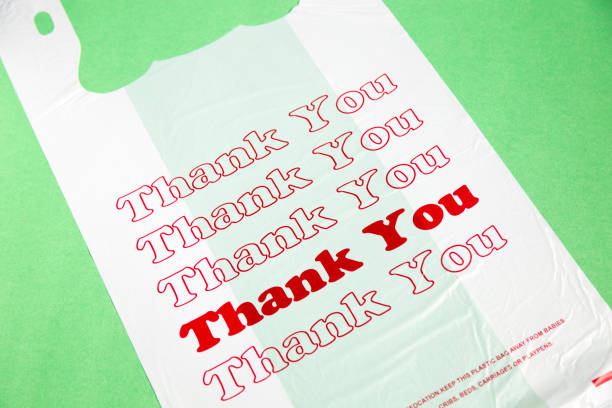 A single plastic shopping bag with red Thank You text.