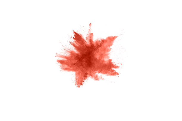 istock living coral color powder explosion on white background. Colored cloud. Colorful dust explode. Paint Holi. 1143140062