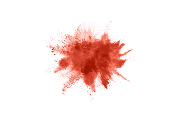 istock living coral color powder explosion on white background. Colored cloud. Colorful dust explode. Paint Holi. 1143140065