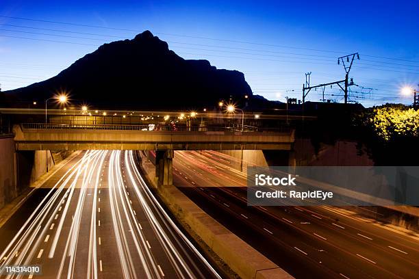 Dusk Traffic Stock Photo - Download Image Now - Asphalt, Blurred Motion, Bridge - Built Structure