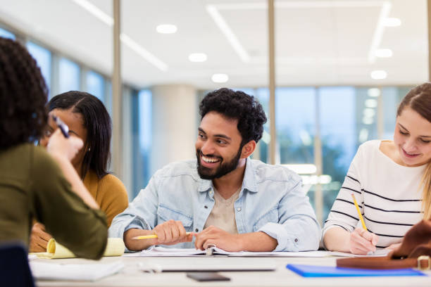 istock College student enjoys studying with friends 1143140651