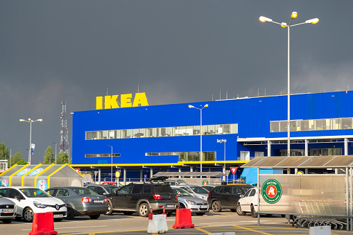Bucharest, Romania - April 16, 2019: IKEA Pallady, the second IKEA store to open in 2019 in Bucuresti, Romania - outside view of the main showroom, as seen from the Auchan supermarket parking lot.