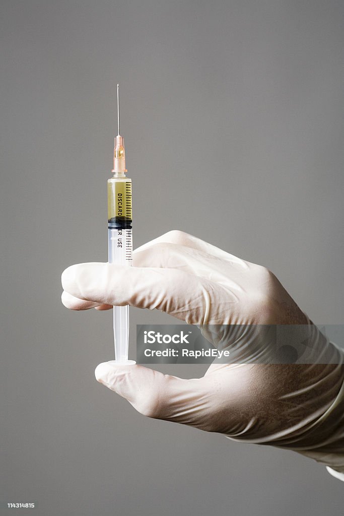 Spritze in der hand doc - Lizenzfrei Arzt Stock-Foto