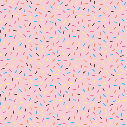 Colorful sprinkles on solid background repeating pattern design