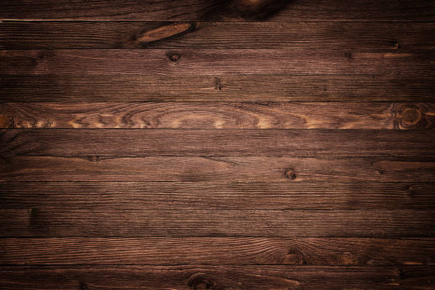 istock ustic plank wood floorboard backdrop with vignette 1143161911