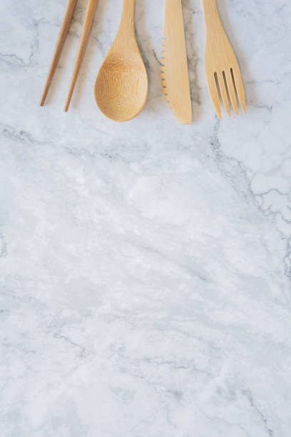istock Bamboo wood toothbrush on clean white marble table top view background concept for save the earth day, world environmental, plastic free, kitchen flat lay lifestyle, bathroom reusable wood product. 1143163682