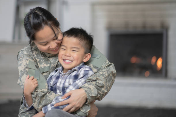 istock Military Mom Hugging Her Son 1143163734