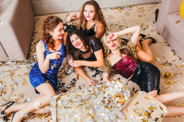 istock girls party mess celebration relaxing fun 1143164429