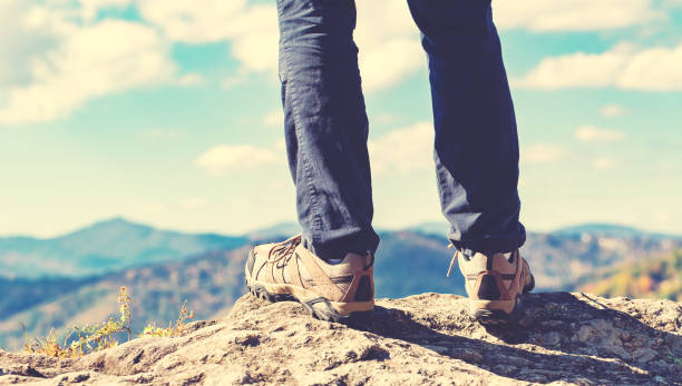 istock Man at the edge of a cliff 1143164668