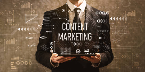 istock Content marketing with businessman holding a tablet computer 1143165353